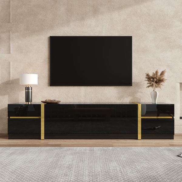 TV-Schrank 180 x 40 x 38 cm in Schwarz, Hochglanz mit goldfarbenen Akzenten, 4 Schubladen und 2 Türen