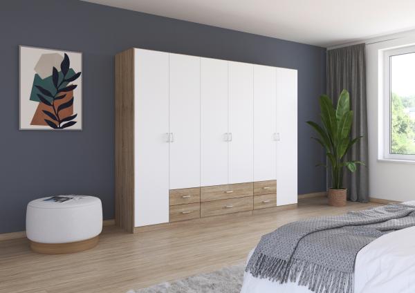 rauch Kleiderschrank, Drehtürenschrank GAMMA, 6-türig, 6 Schubkästen, Alpinweiß/Eiche Sonoma, 271 x 210 x 54 cm