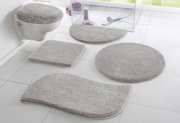 OTTO home Badematte Merida, Badvorleger, Badezimmer Teppich, Höhe 32 mm, rutschhemmend beschichtet, schnell trocknend, strapazierfähig, fußbodenheizungsgeeignet, Kunstfaser, wellenförmig, Badteppich, Uni Farben, rechteckig, rund & als 2-tlg. Set erhält...