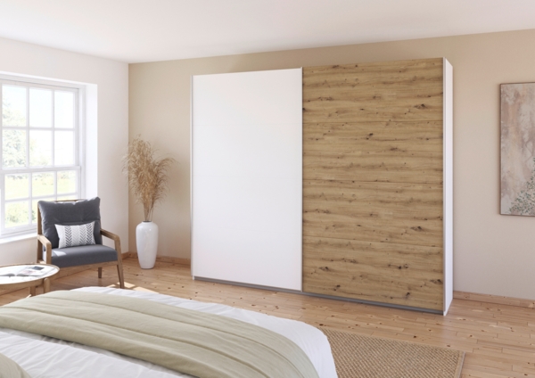 rauch Quadra, Kleiderschrank, Schiebetürenschrank, 2-türig, mit 3 Kleiderstangen und 6 Einlegeböden, Farbe Weiß/Eiche Artisan, BxHxT 271x229x62cm