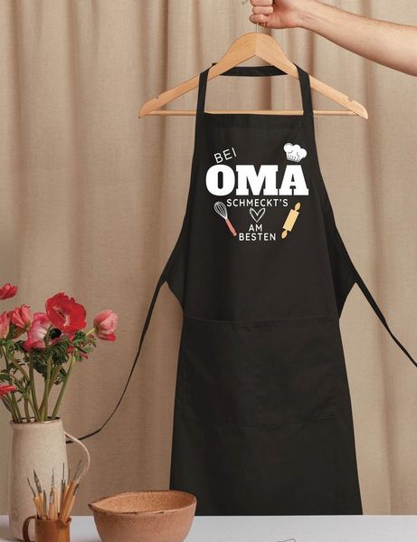 Youth Designz Grillschürze Damen Schürze "Bei Oma schmeckt es am Besten" Print Kochschürze, mit lustigem Spruch & Logo Aufdruck