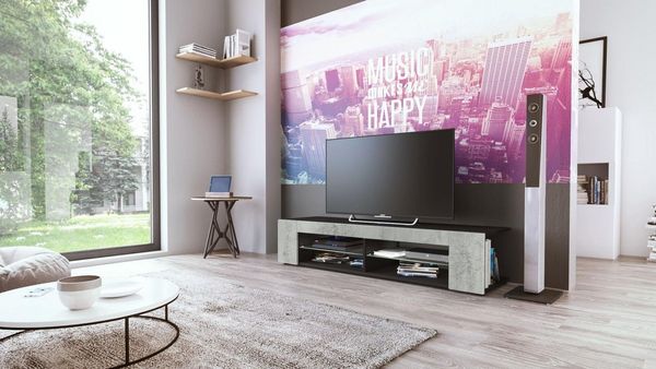 Vladon Lowboard Movie, TV-Kommode mit 4 offenen Fächern und Zierleisten, Schwarz matt/Beton Oxid-Optik (134 x 29 x 39 cm)