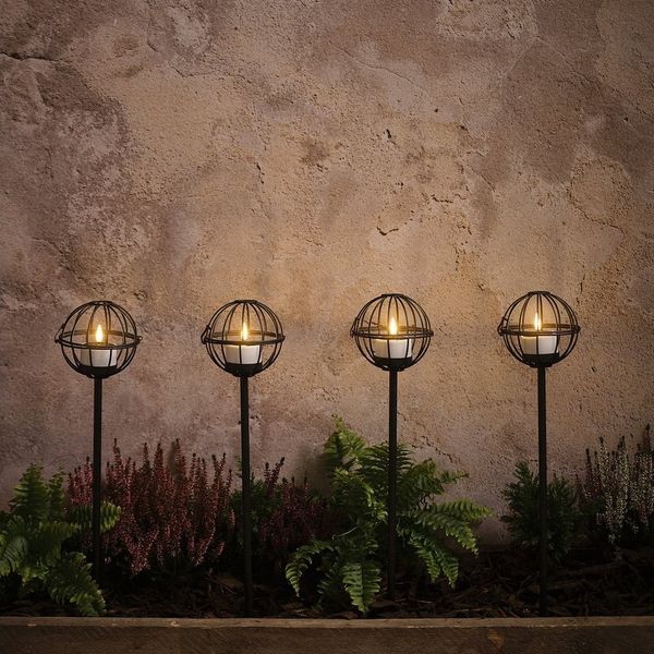 Lights4fun LED Gartenleuchte 4er Set Outdoor TruGlow® Solar-Teelichter mit Erdspieß