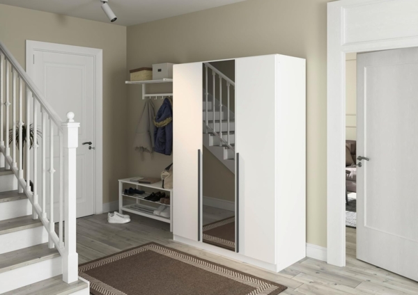 rauch Kleiderschrank Alba, Drehtürenschrank, Garderobenschrank, 3-türig, mit Spiegel, mit 2 Kleiderstangen, 2 Einlegeböden und Schubladeneinsatz, Farbe Weiß, Griffstange Grau metallic, Schwarz, 136x197x54cm Bild 2