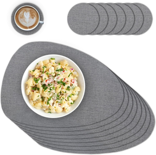 matches21 HOME & HOBBY Platzset Ovales Tischset mit Glasuntersetzer, 8er Set, in Grau meliert, (8-St), Hitzebeständige abwaschbare PVC Platzsets
