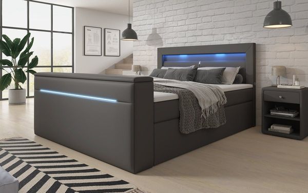 Luxusbetten24 Boxspringbett Reposito, mit TV Lift, USB, LED und Stauraum